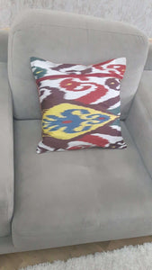 Suzani hand-embroidered cushion cover with Ikat fabric at the back