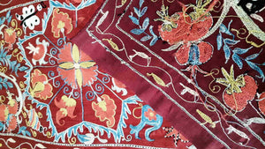 Suzani hand-embroidered silk fabric - red