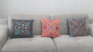 Suzani hand-embroidered cushion cover with Ikat fabric at the back