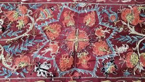 Suzani hand-embroidered silk fabric - red