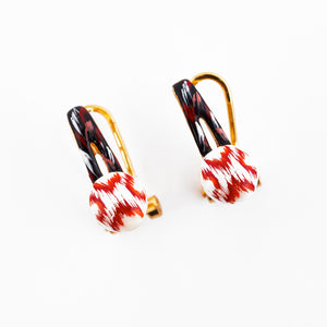 Gold earrings with traditional Ikat pattern
